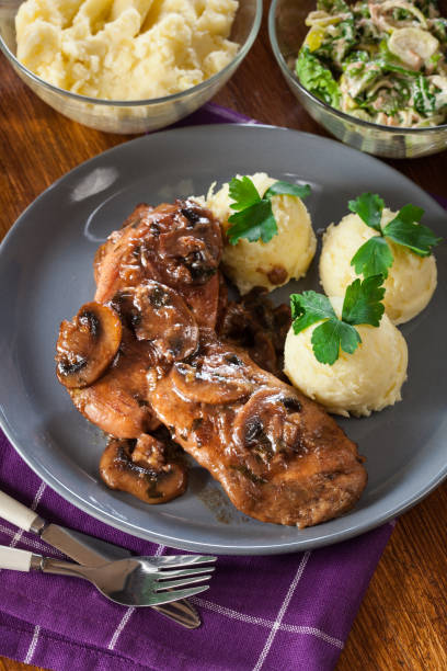 istock Delicious chicken marsala served with mashed potatoes 1095247386