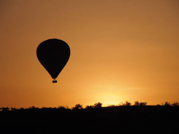 istock Hot air balloons flying over spectacular Cappadocia 1095254656