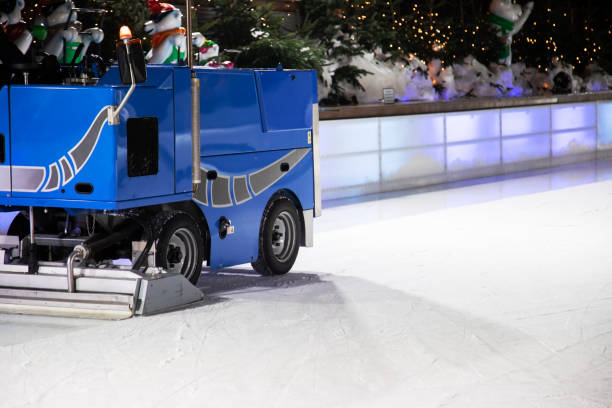 istock Machine ice harvester cleans the ice rink, smooth and renew the rink surface 1095255546