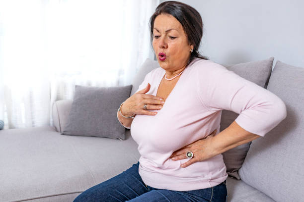 istock Mature woman holds her heart 1095258712