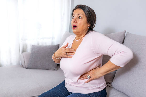 istock Mature woman holds her heart 1095259166