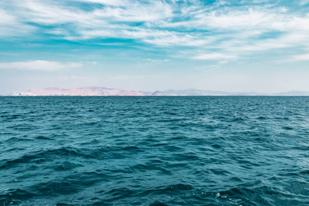 istock Deep Blue Sea With Island Background 1095260736