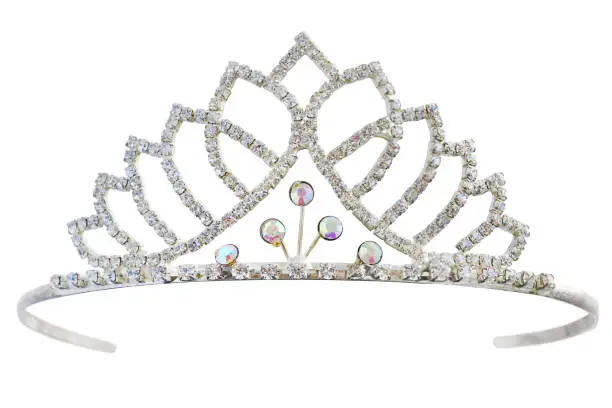 Tiara with white diamonds.  Crown for princess. Expensive jewelry. Decoration for queen, miss contest tiara isolated on white background. Full depth of field, with clipping path