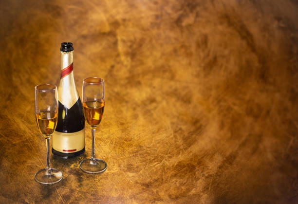 champagne glasses on gold background. Valentines day