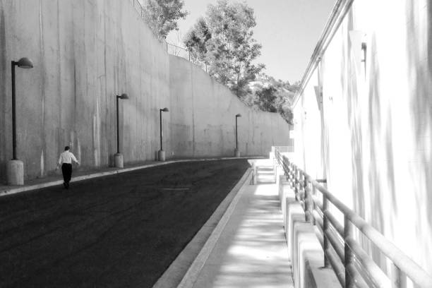 istock Shadows and sunlight on a near empty street 1095268634