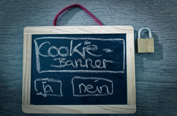 Blackboard with inscription cookie banner and padlock