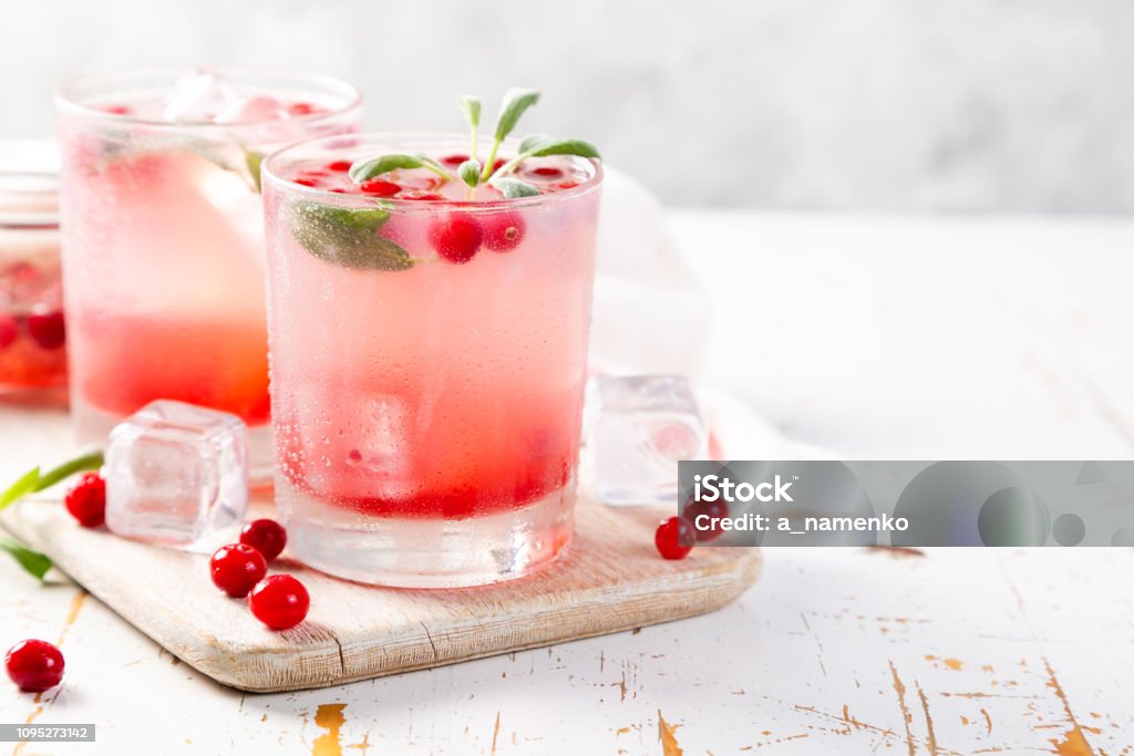 Cranberry and sage cocktail, drinking vinegar Cranberry and sage cocktail, drinking vinegar, copy space Drink Stock Photo