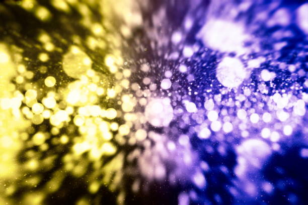 Festive background with natural bokeh and bright golden lights. Vintage Magic background with colorful bokeh. Spring Summer Christmas New Year disco party background.