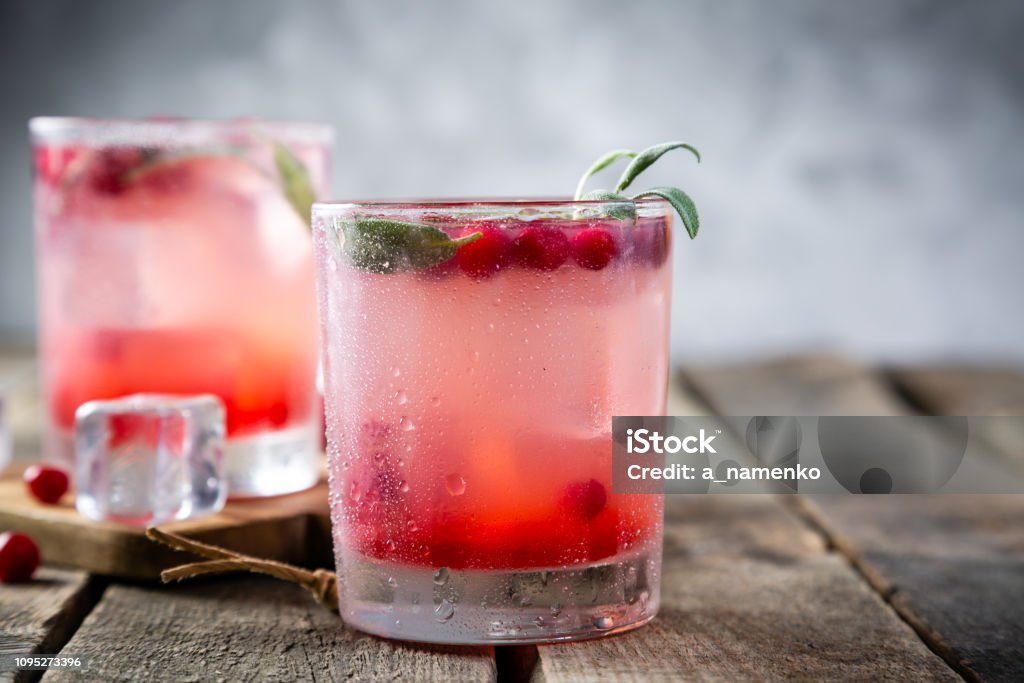 Cranberry and sage cocktail, drinking vinegar Cranberry and sage cocktail, drinking vinegar, copy space Cocktail Stock Photo