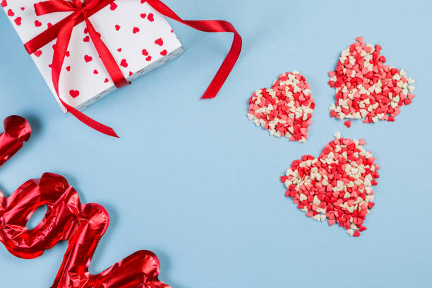 istock Valentine's day background - present, love baloon, confetti 1095277016