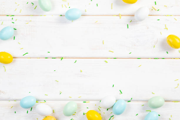 Easter background - cookies shaped like eggs, flowers, bunnies