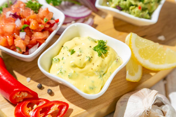 istock Selection of mexican sauces - salsa, guacamole, cheese sauce 1095277436
