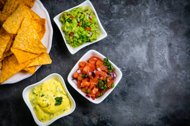 istock Selection of mexican sauces - salsa, guacamole, cheese sauce 1095278090