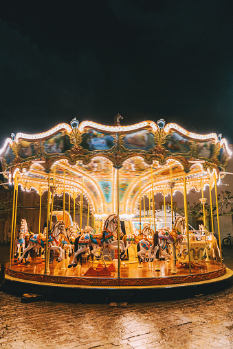 Carousel at night on Christmas market