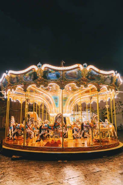 Carousel at night on Christmas market Carousel at night on Christmas market carousel photos stock pictures, royalty-free photos & images