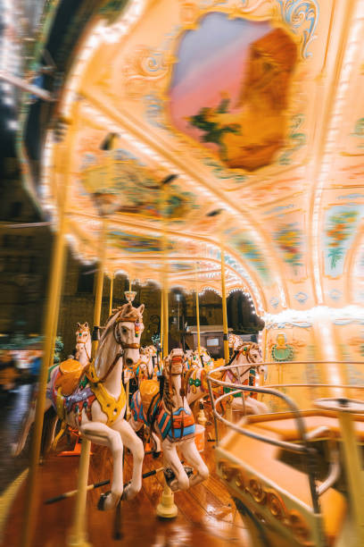 istock Carousel at night on Christmas market 1095280230