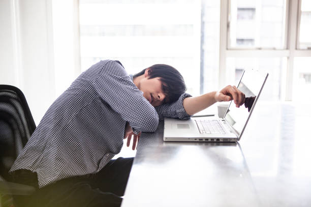 istock Male employees tired and dozing 1095285204