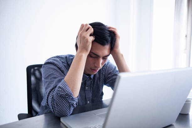 Male employees troubled with their heads