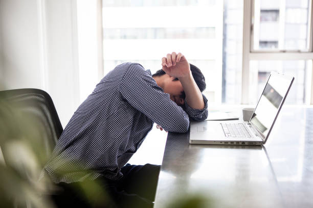istock Male employees tired and dozing 1095285224