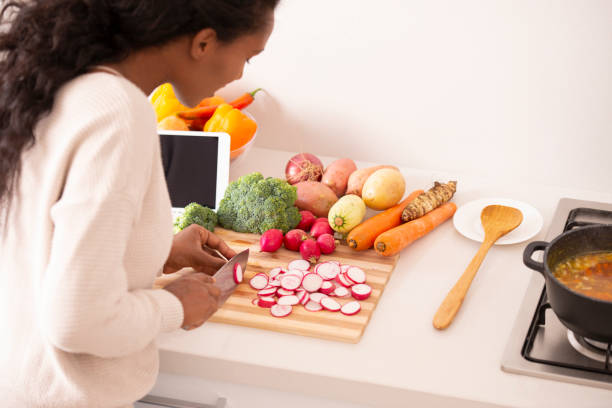 istock Woman preparing healthy comfy soup. 1095285382