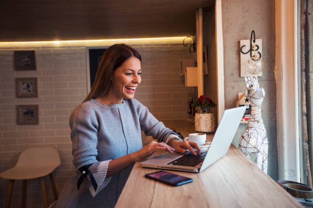 istock Girl freelancer working at cafe 1095288152