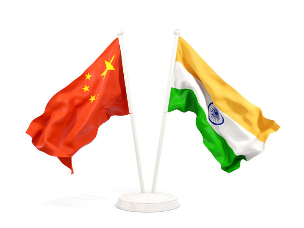 istock Two waving flags of China and india 1095296908