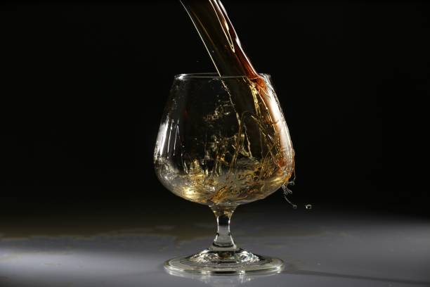 istock glasses and bottles for brandy and wine in the background 1095299196