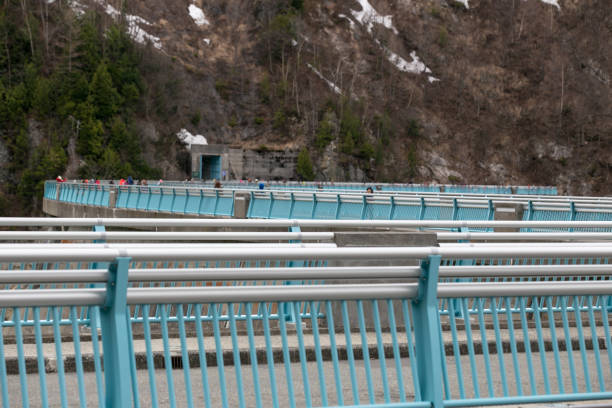 Tateyama, Japan - April 18, 2016 : Unidentified tourist on kurobe dam in snow for travel japan alpine route on April 18, 2016 Tatayama, Japan