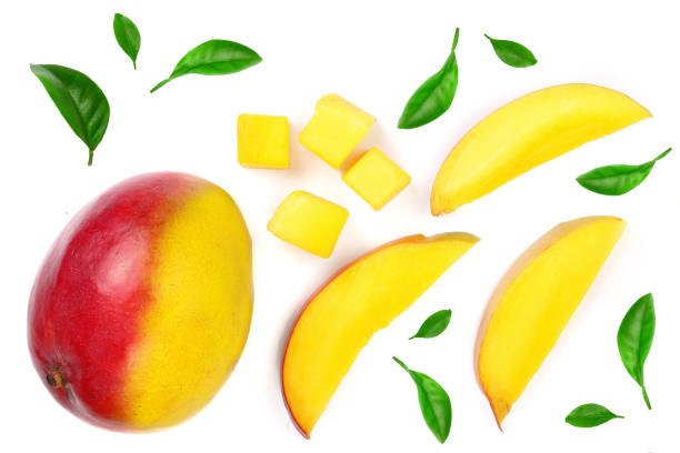 istock Mango fruit decorated with leaves isolated on white background close-up. Top view. Flat lay 1095305204