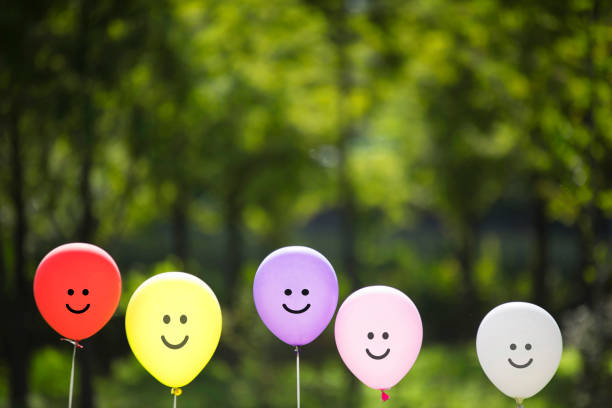 istock space for text. balloons in the green park. 1095311136