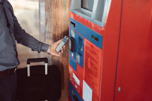 istock Passenger paying contactless on the ticket machine 1095312676