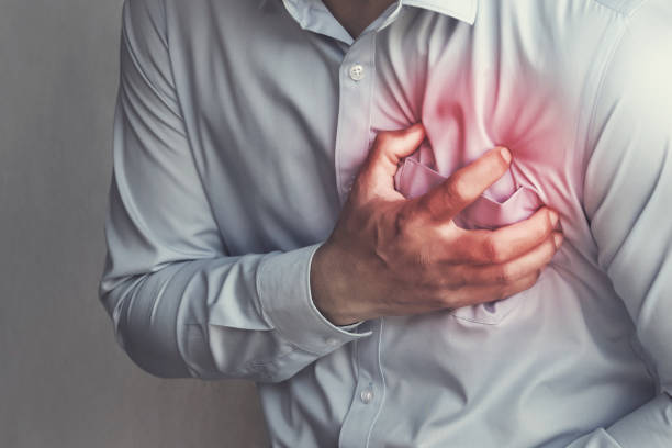 people chest pain from heart attack. healthcare concept - chest pain imagens e fotografias de stock