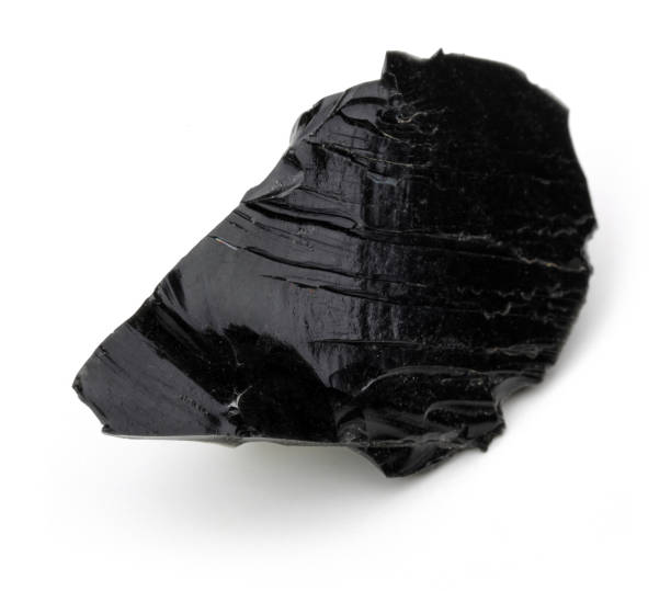 schwarzer obsidian stück - onyx stock-fotos und bilder
