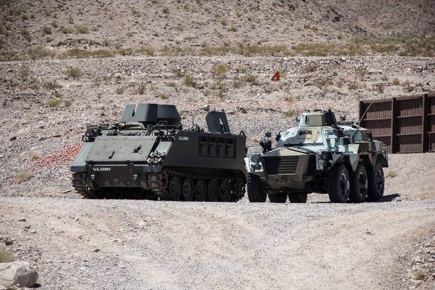 tank and armoured vehicle stationed in the desert - military us military tank land vehicle imagens e fotografias de stock