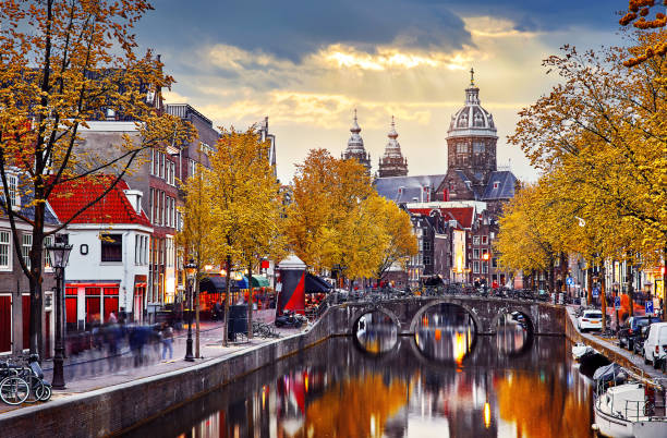 istock Amsterdam, Netherlands. Autumn sunset in Red-light district. 1095327132