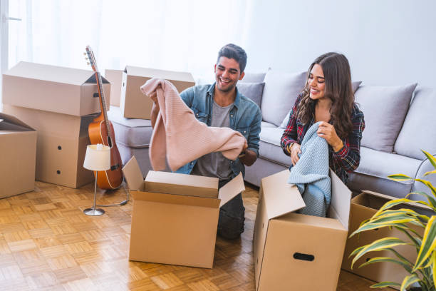 istock Young happy couple move to a new home 1095331936