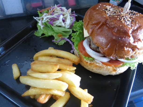 istock hamburger and french fries 1095332812