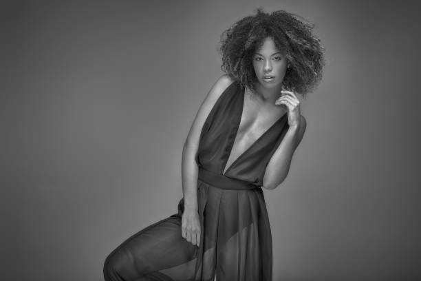 istock Elegant afro lady in exquisite  black dress. 1095346748