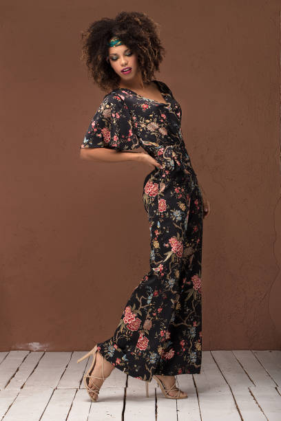 istock Stylish afro girl posing in studio. 1095348036