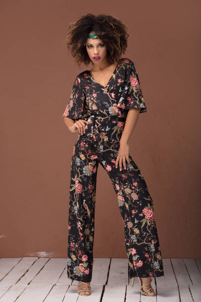 istock Stylish afro girl posing in studio. 1095348166