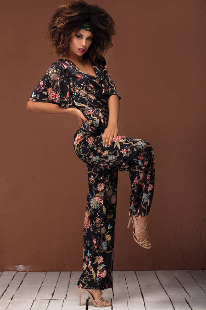 istock Stylish afro girl posing in studio. 1095348440