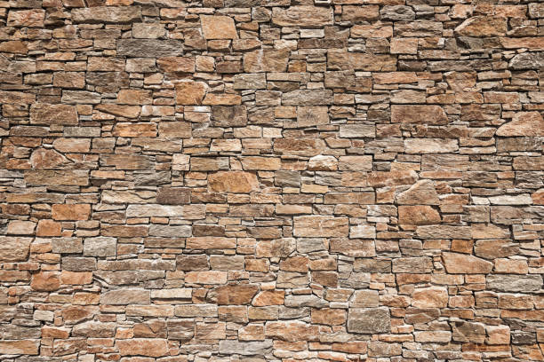 perfekt para fondos de pared de piedra hecho a mano - retaining wall fortified wall surrounding wall stone wall fotografías e imágenes de stock