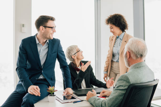 istock Happy coworkers at office 1095352896