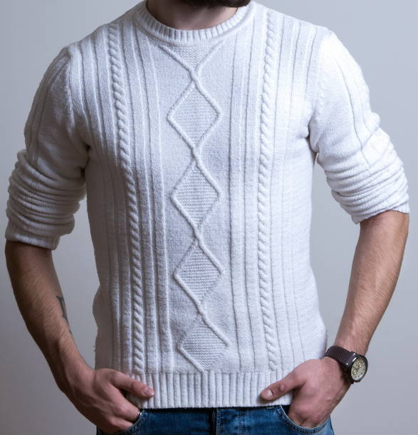 istock Midsection Of Man Wearing Sweater While Standing Against White Background 1095354570