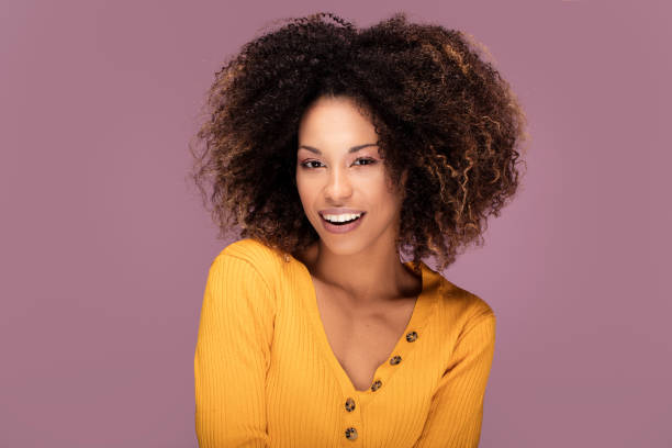 istock Young afro woman smiling. 1095355096