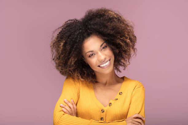 istock Young afro woman smiling. 1095355312