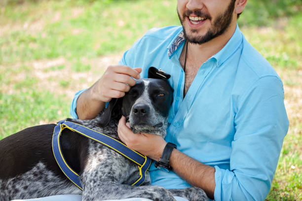 istock Young man spending time with his hunter dog outdoors. 1095358410