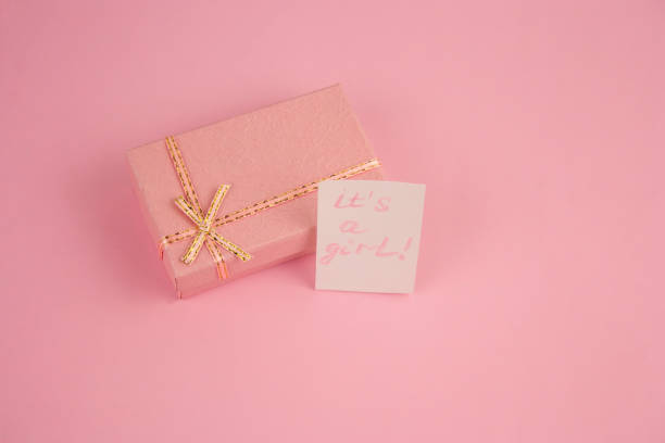 istock pink box on pink background and note its a girl 1095359602
