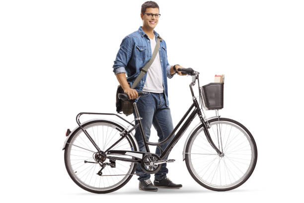 istock Casual young man standing with a bicycle 1095371856