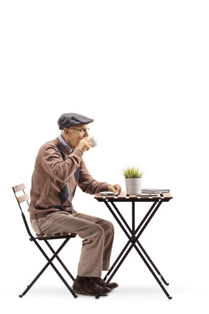 istock Senior man sitting and drinking coffee 1095372432